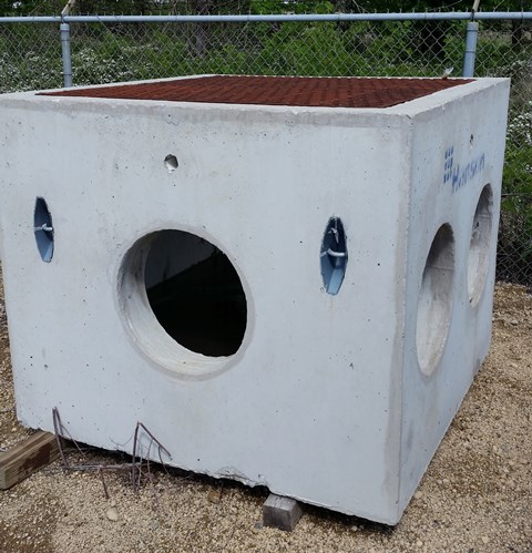 Hanson Concrete Catch Basin  5X5 w/ 3 - 18 inch Cut Outs & Metal Grating Top