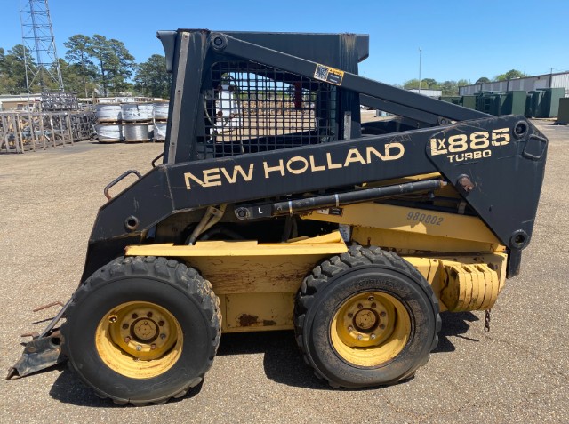 1998 New Holland LX885 Skid Steer & Attachments