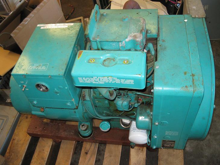 Generator: Onan 7.5kW Generator w/ Transfer Switch