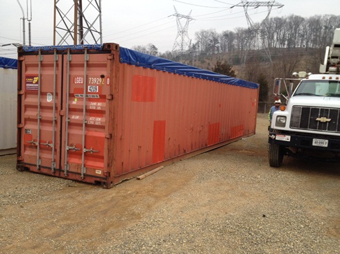 Two (2) open top storage containers